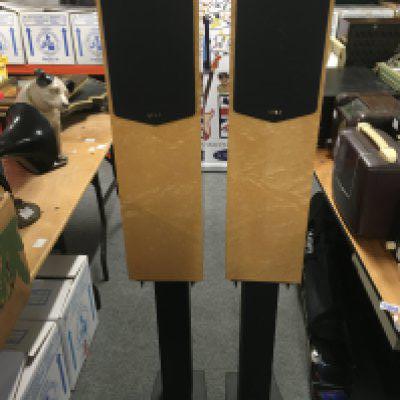 A pair of Quad 21L floorstanding speakers with stands.