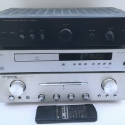 A Marantz PM7001 amplifier, a Pioneer PL-514 turntable, an Arcam CD73 CD player and a Rotel RA-930AX amplifier. Includes a Marantz remote control.