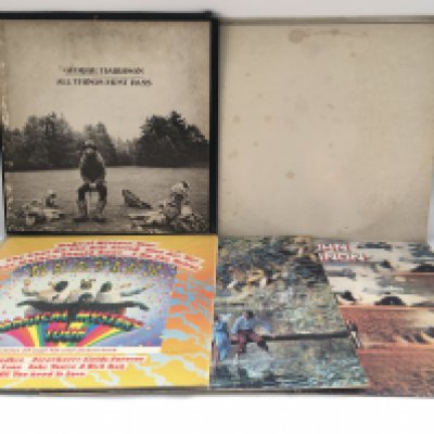 Five Beatles and related LPs comprising 'Magical Mystery Tour', 'The White Album', 'All Things Must Pass' and others.