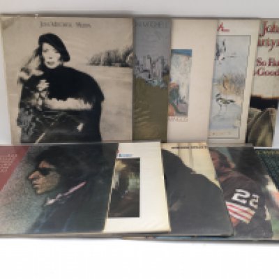 Two bags of 20 folk rock LPS by various artists including Bob Dylan, Joni Mitchell, Neil Young and others.