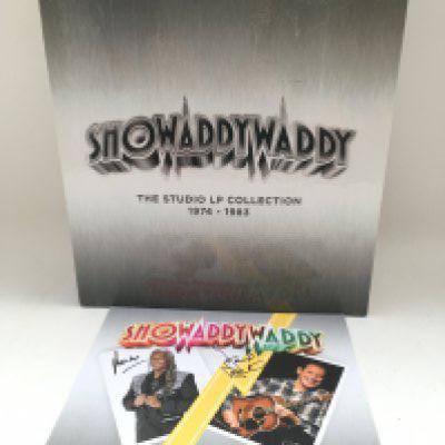 A Showaddywaddy 8LP 'The Studio LP Collection 1974-1983' on coloured vinyl with signed insert.