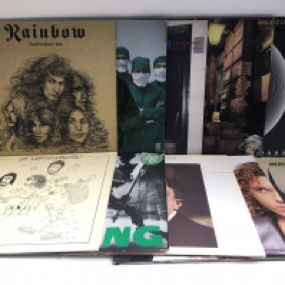 Ten rock LPs by various artists including Rainbow, Queen, INXS and others.