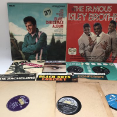 A collection of mainly rock n roll LPs, EPs, 7" singles and 78s by various artists including Elvis Presley, Gene Vincent, Bill Haley and others.