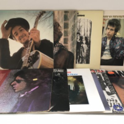 Two bags of 18 Bob Dylan LPs comprising 'Blonde On Blonde', ' Highway 61 Revisted', 'Nashville Skyline' and others.