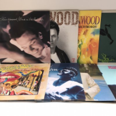 Sixteen LPs by various artists including Steve Winwood, Bryan Ferry, Supertramp and others.