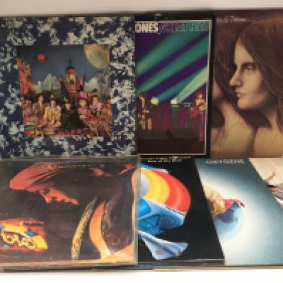 A collection of LPs and 12" singles by various artists including The Rolling Stones, ELP, Chic and others.