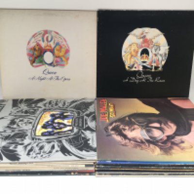 A collection of LPs by various artists including Queen, Thin Lizzy, John Dummer Blues Band and others.