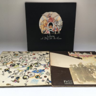 Two early pressings of Led Zeppelin LPs on red/plum Atlantic labels comprising 'II' and 'III' and 'A Day At The Races' by Queen (3).