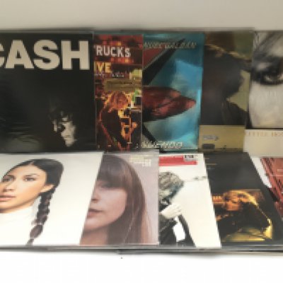 A collection of 32 country, folk and world music LPs by various artists including Drive By Truckers, Jim White, Lucinda Williams and others. Comprising mainly 180g pressings.