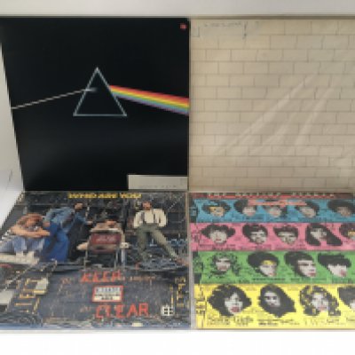 Two Pink Floyd LPs comprising 'Dark Side Of The Moon' and 'The Wall' plus 'Some Girls' by The Rolling Stones and 'Who Are You?' by The Who.