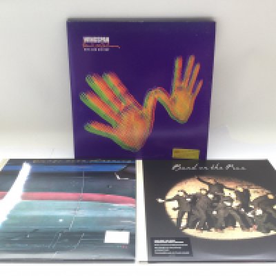 Three Wings LPs comprising a 4LP 'Wingspan', a 180g audiophile 3LP 'Wings Over America' and a 180g audiophile 2LP 'Band On The Run'.