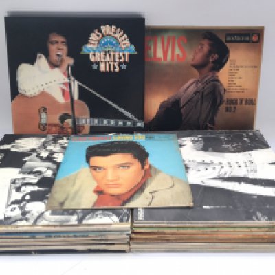 A collection of Elvis Presley LPs including 'Rock n Roll No.2', 'Elvis Is Back' and others.