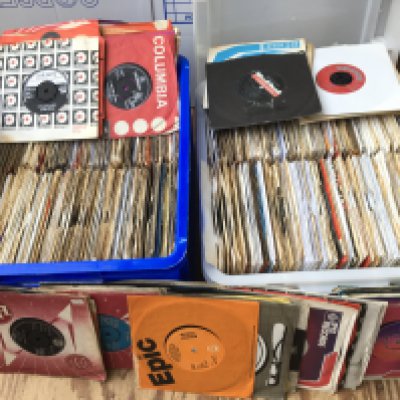 Two boxes of 7" singles by various artists from the 1960s onwards.