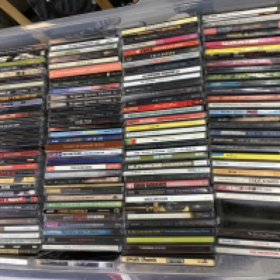 Ten boxes of CDs by various artists including Jimi Hendrix, My Chemical Romance, Weezer, Bob Mould and many more.