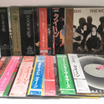 A box of Queen and related LPs and 12" singles including many Japanese pressings plus limited editions and laser discs.