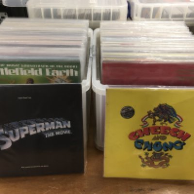 Two boxes of Comedy, TV and film soundtrack LPs including Cheech & Chong, Monty Python, The Black Hole and many more.