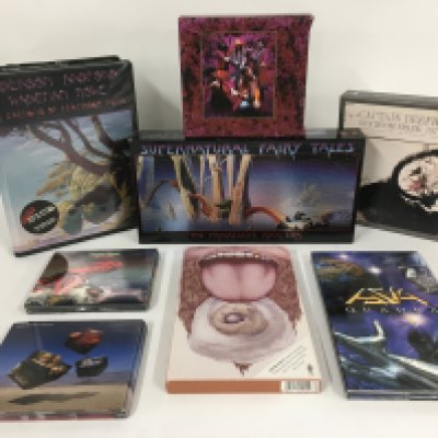 A collection of prog and psychedelic rock CD box sets by various artists including Captain Beefheart, Gentle Giant and others.