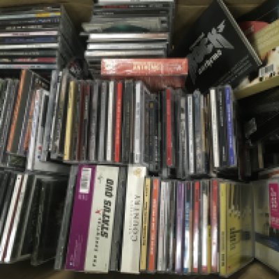 A box of CDs by various artists.