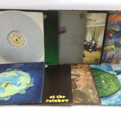 Two bags containing 20 rock and prog rock LPs by various artists including The Who, Alex Harvey, Focus, Yes and others.