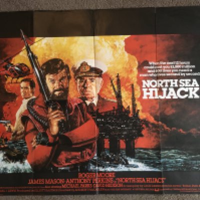 A UK quad film poster for 'North Sea Hijack', folded with small holes and tears, approx 101cm x 76cm.