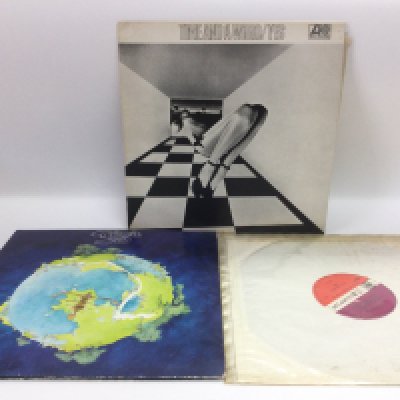 Three early UK pressings of Yes LPs on red/plum Atlantic labels.