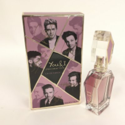 A fully signed One Direction 50ml 'You & I' perfume. In 2014 the vendor was gifted the item by Mike Edwards who was involved in the One Direction fragrance project.