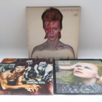 Three early UK pressings of David Bowie LPs comprising 'Aladdin Sane', 'Hunky Dory' and 'Diamond Dogs'.