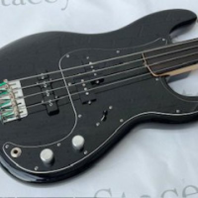 A 2014 Fender USA Tony Franklin Fretless Precision Bass Guitar in unplayed near-mint condition. Comes with all original parts and D Tuner. Black finish unmarked with very little player to the neck or fingerboard still has CE sticker on neckplate. Original case