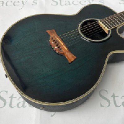 A Crafter FX550EQ Electro Acoustic Guitar with LR Baggs internal pickup and preamp. Translucent dark turquoise blue. Unplayed with no evidence of playwear or fretwear. No case