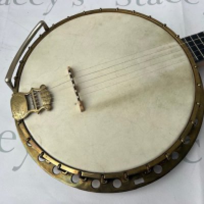 A late Victorian Windsor of Birmingham Model Number 2 Sultan "The Whirle" 5 string banjo. All Rock Maple construction with ebony fingerboard. Windsor Pyxe brass tailpiece with detailed engraving. One mother of pearl inlay missing, otherwise in particularly good condition considering its age and use. Comes with non original hard case.