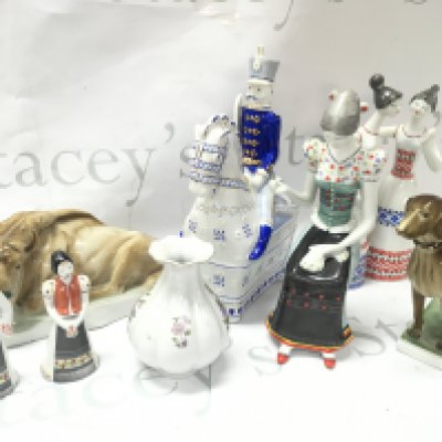 Hungarian Hollohaza and Zsolnay Pecs porcelain figures and a vase. Figures including soldier on horseback , dog figure, Needlewoman , Bison etc. this lot cannot be posted