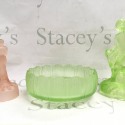 Collection of Art deco glass including a bowl 20 cm wide ,frosted pink glass nude lady figure and a Peter Pan uranium glass figure 24cm tall approximately. This lot cannot be posted