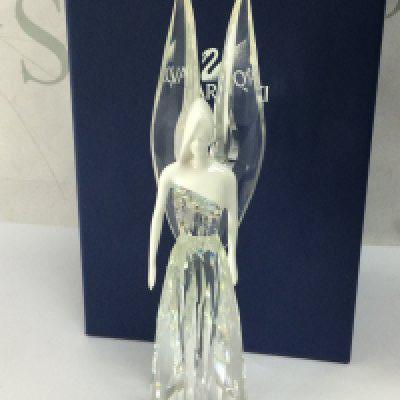 A boxed Swarovski crystal glass angel Adrienne figure. No obvious damage or restoration.This lot cannot be posted