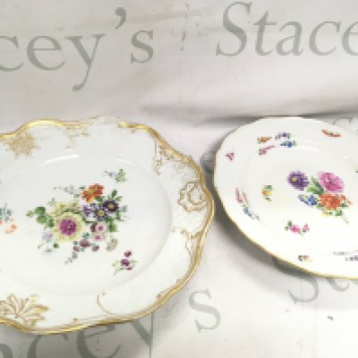 Two Meissen plates, signed on the base 26 and 24cm wide . This lot cannot be posted