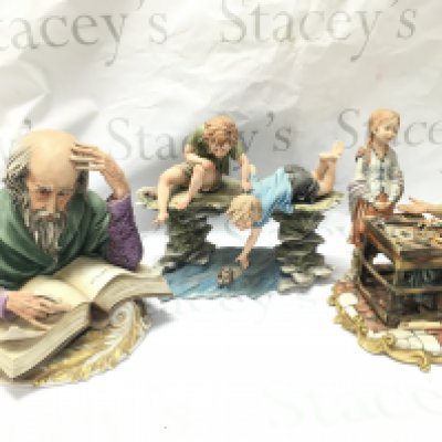 Capodimonte figures including the writer, Cobbler, boys Saving dog. Tallest 24cm tall. This lot cannot be posted