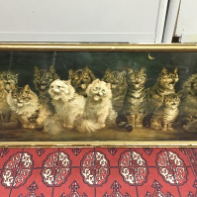 A framed Louis Wain (1860-1939) Cats chorus by moonlight print. Frame dimensions 102x46cm