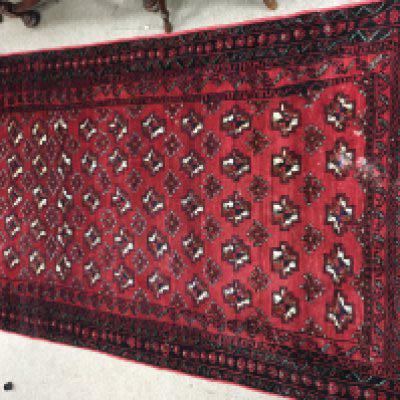 A Persian wool rug. Approx measurements 110x184cm. NO RESERVE