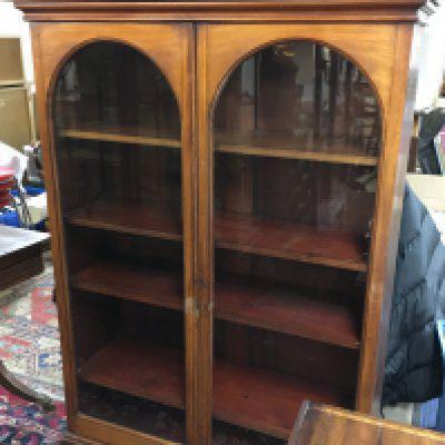 A mahogany bookcase cabinet with glass doors , dimensions