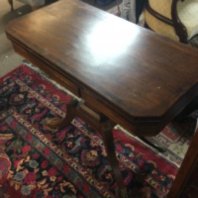An inlaid regency style card table with a green leather top 76cm tall 89cm wide 44cm deep approximately . Games table 89x89cm