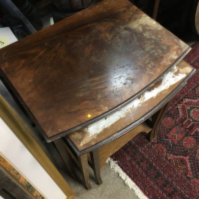 A nest of walnut tables . Biggest 50cm tall 50cm wide