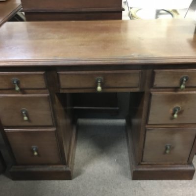 A mahogany pedestal desk, dimensions 99cm wide 75cm tall
