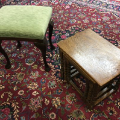 A mahogany stool 52cm tall 50cm wide and a nest of oak tables 44cm tall 48cm wide
