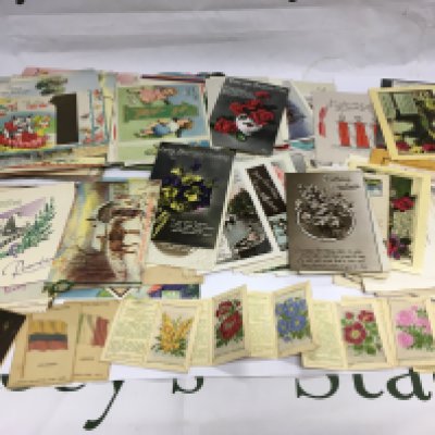 A collection of vintage postcards and greetings cards. Shipping category B.
