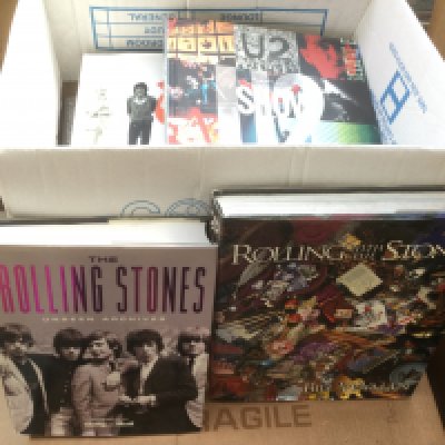A collection of rock music books on various artists including The Rolling Stones, U2, The Kinks, The Who, David Bowie, Paul McCartney & Wings and Status Quo.
