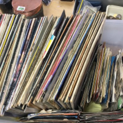 A collection of vinyl records LPS including the Eagles, Dire Straits, U2 etc and singles by Bowie, The Stranglers etc. NO RESERVE
