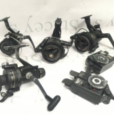 Fishing spinning reels including a Shimano x3000, 4500, etc . Postage category B