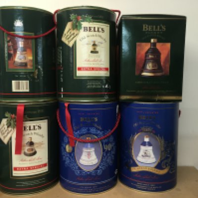 A Collection of 8 bell&#2013266057۪s whiskey boxed decanters including commemorative,
