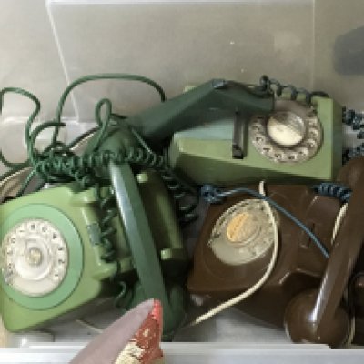 Three vintage telephones . Postage category C