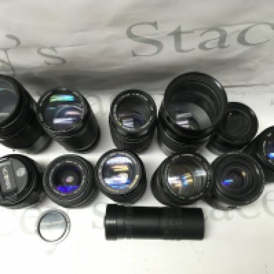 A Collection of various cameras lenses including Nikon , Sigma, Miranda , Hanimex etc . This lot cannot be posted