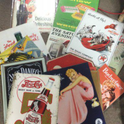 A collection of metal advertising signs including Ford , Winston cigarettes, Coca Cola etc. postage cat C